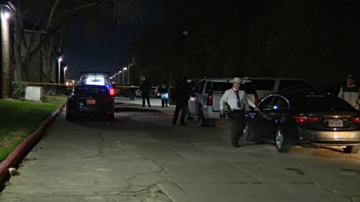 Harris County Sheriff's Office deputies arrive at the scene of the shooting