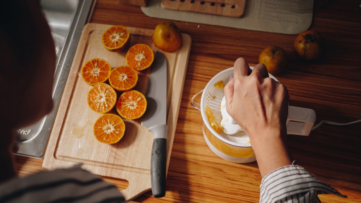 juicing an orange