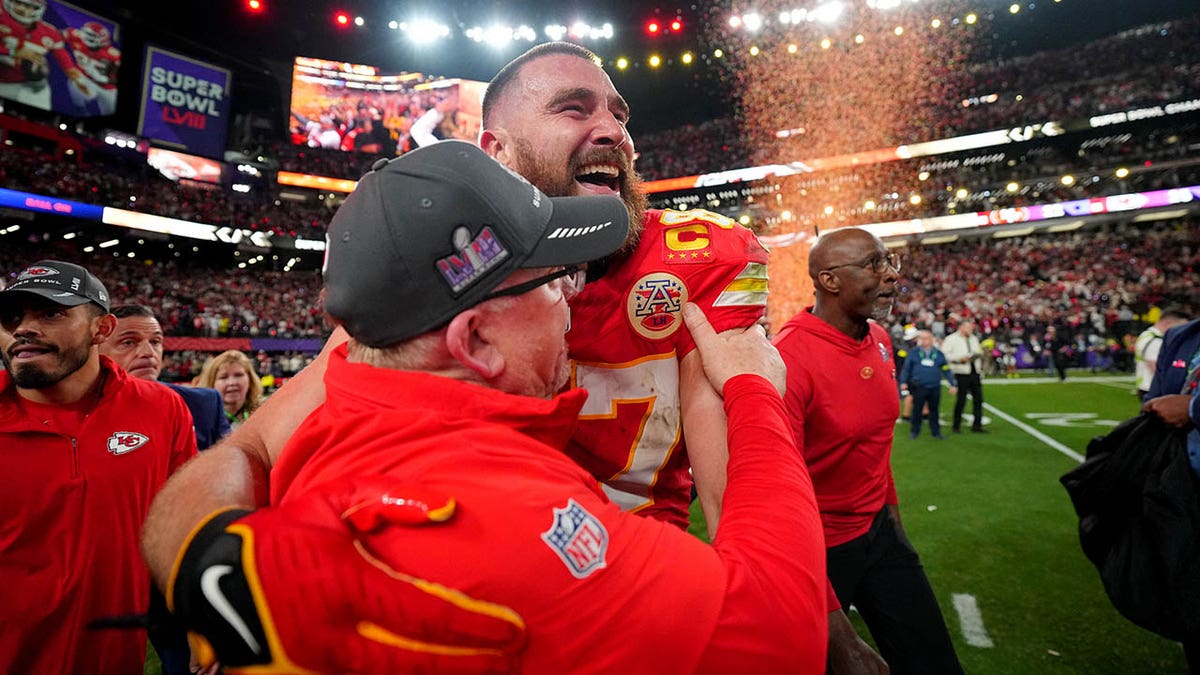 Andy Reid and Travis Kelce hug