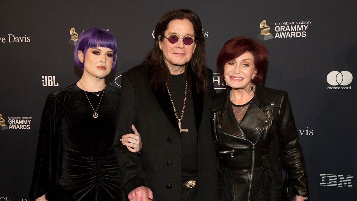 Kelly Osbourne with parents Ozzy and Sharon