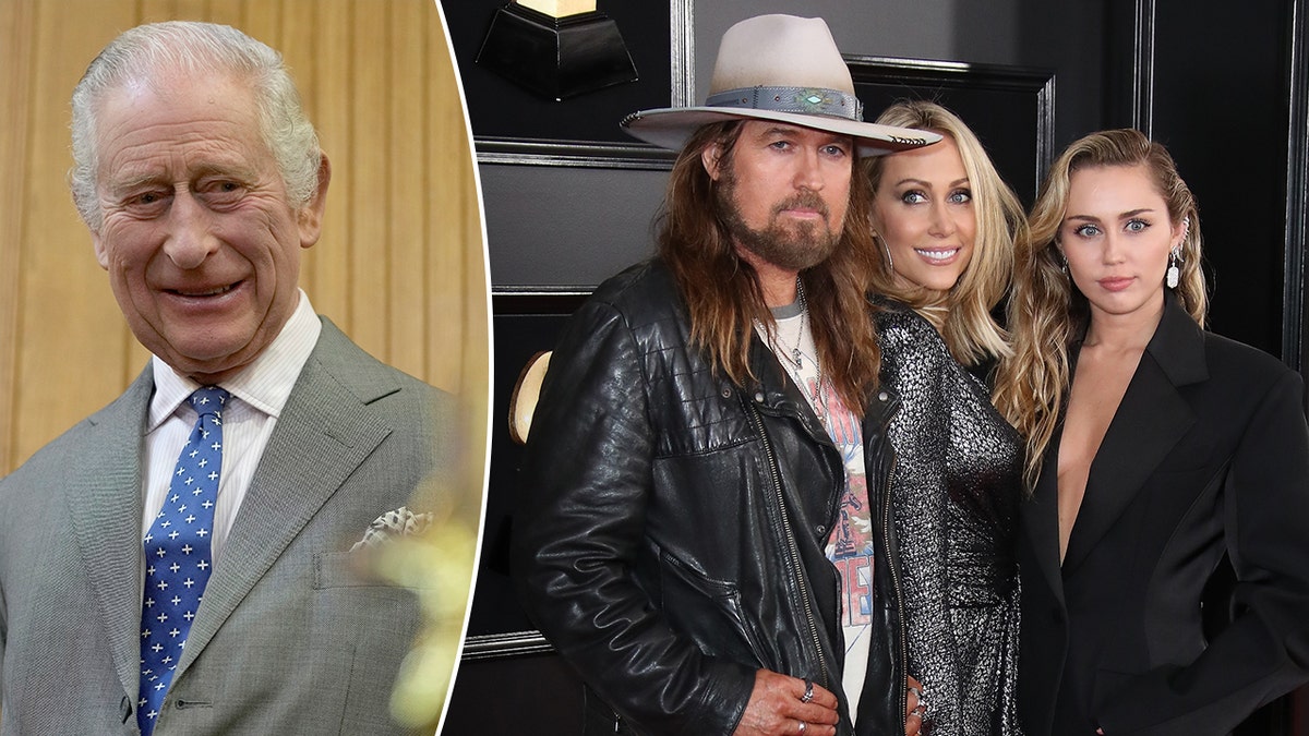 King Charles smiles wearing a grey suit and blue tie split Miley Cyrus on the carpet in a black plunging blazer with parents Billy Ray and Tish