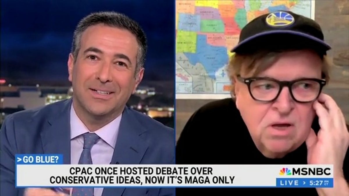 photo of Ari Melber and Michael Moore on MSNBC