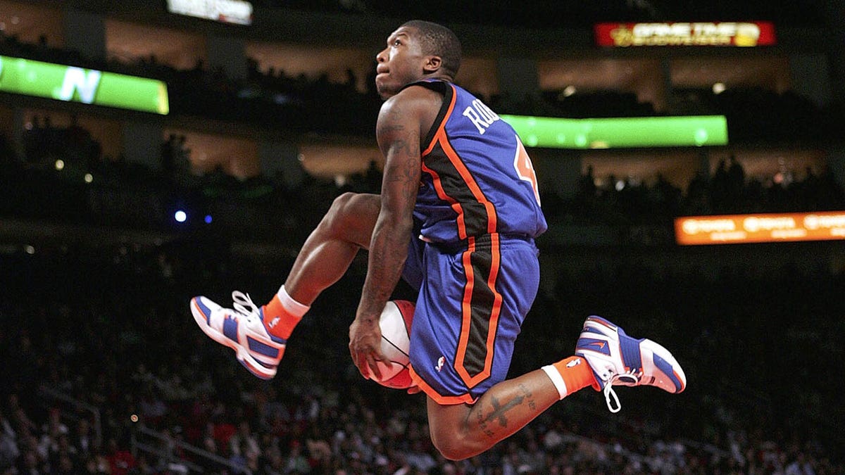 Nate Robinson in between legs dunk