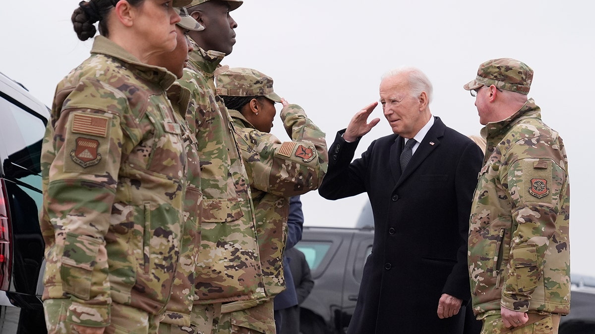 Biden salutes American soldiers at Dover Air Force Base