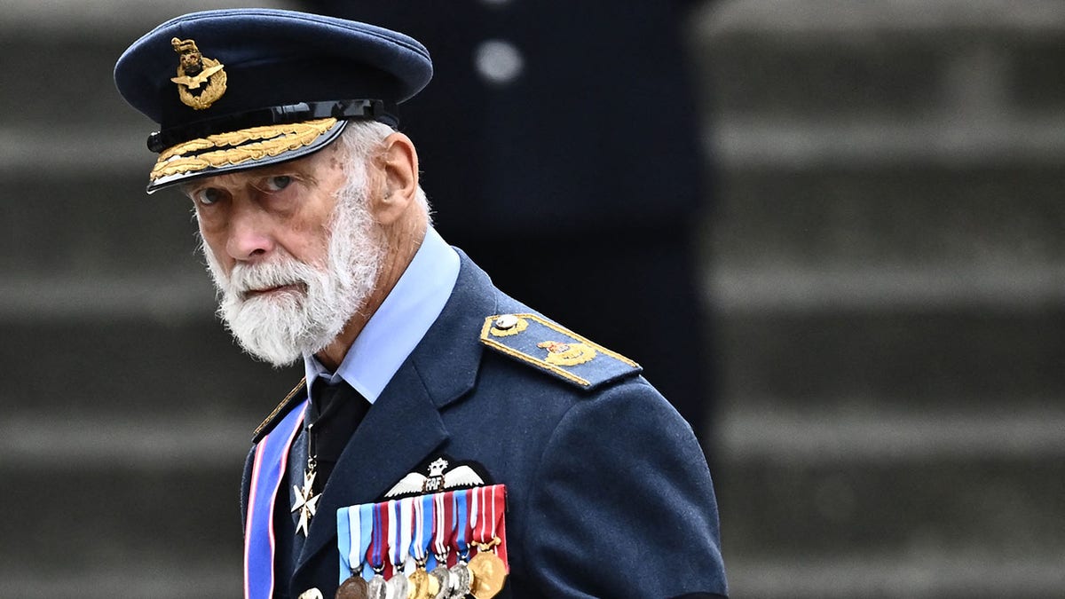 Prince Michael looks downcast at Westminster Abbey in his blue uniform and cap to attend Queen Elizabeth's funeral