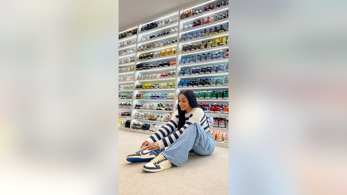 Woman with shoe collection