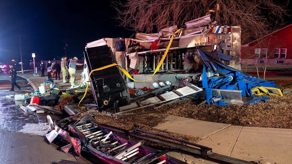 Mangled fire truck following rollover