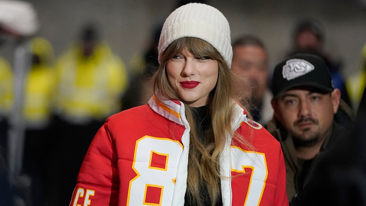 TAylor swift in Travis Kelce jacket 