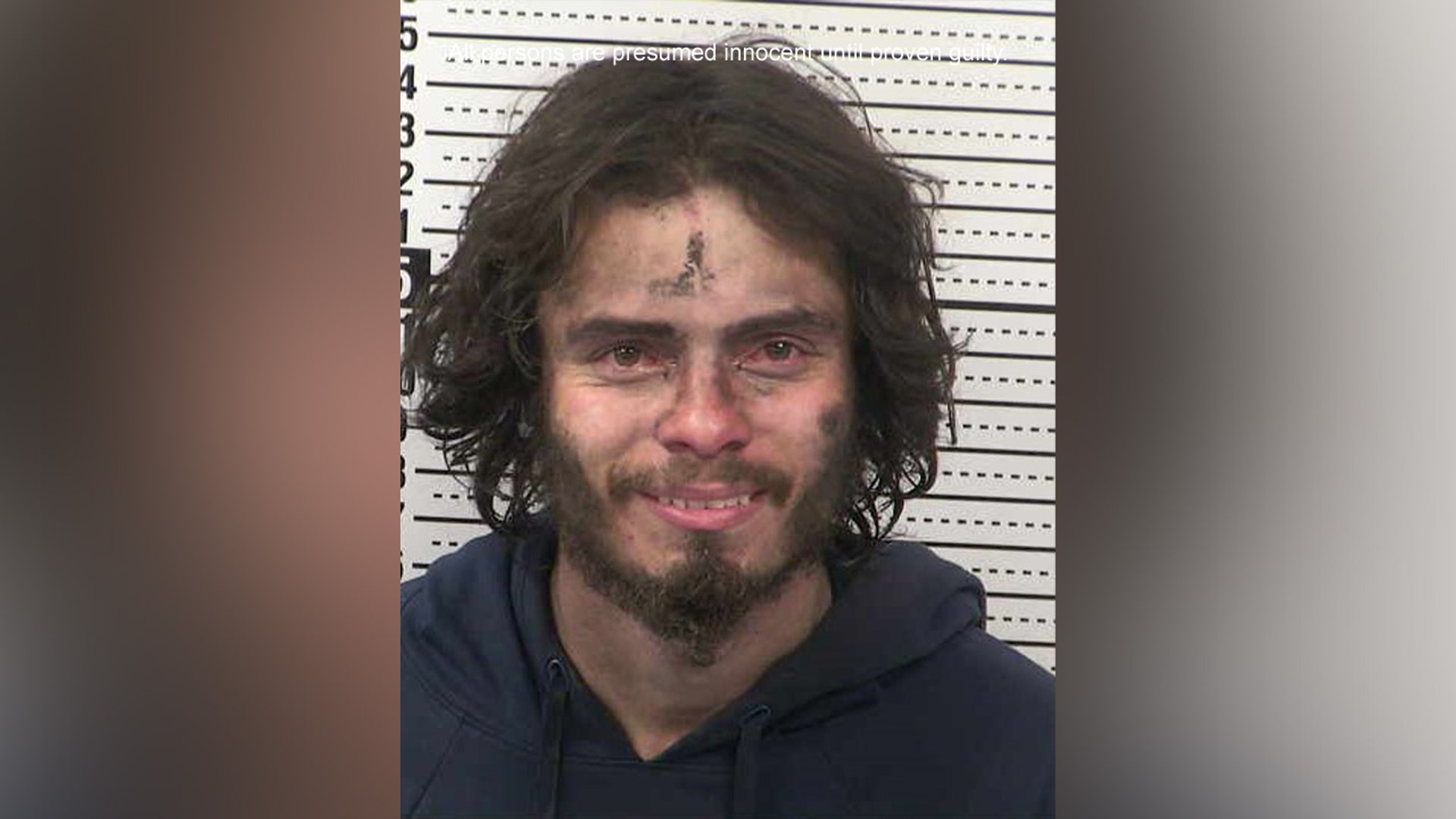 A mugshot of Christian Henry