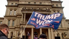 Former Michigan police officer accused of fake elector plot denies intending to make false public record