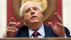 West Virginia Gov. Justice seeks to block bank's land auction to collect on his loans
