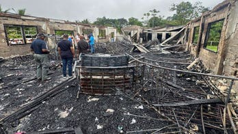Parents of teens who survived fatal dorm fire in Guyana sue the government for negligence