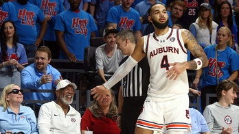 Auburn's Johni Broome has run-in with Morgan Freeman during Ole Miss game, apologizes to actor