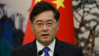 China's former foreign minister, missing from public view since last June, resigns from national legislature