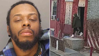 Philadelphia escapee spotted leaving home still wearing handcuffs in new video after fleeing from officers