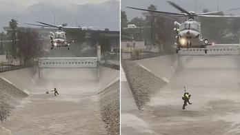 Los Angeles Fire Department uses helicopter to rescue man, dog from Los Angeles River