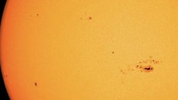 Large cluster of sunspots that can cause strong solar flares and affect power grids detected by NASA