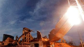 St. Louis demolition crew accidentally hits transmission tower with wall, causing explosion