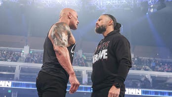 The Rock makes surprise appearance at WWE, stares down champion Roman Reigns amid WrestleMania speculation