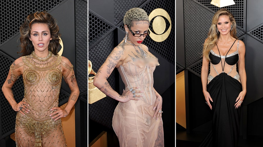 Miley Cyrus walks the red carpet at the Grammys in gold