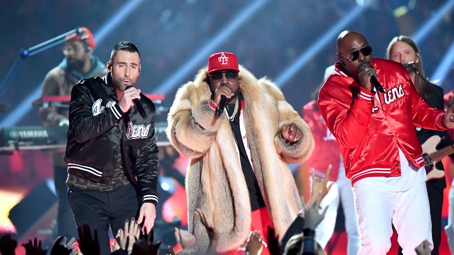 Adam Levine of Maroon 5, Big Boi and Sleepy Brown perform during the Pepsi Super Bowl LIII Halftime Show