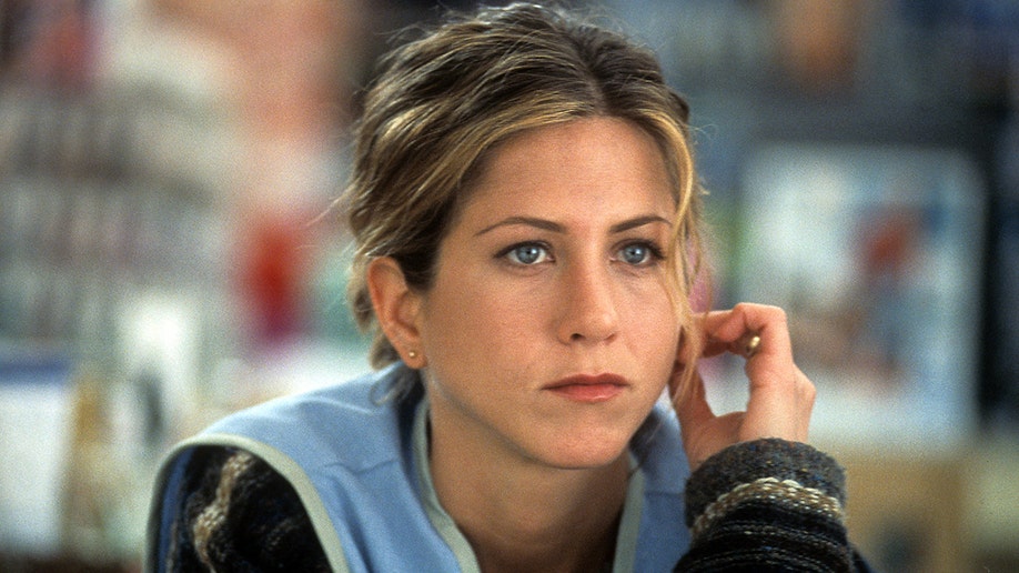 Jennifer Aniston at work in a scene from the film 'The Good Girl'