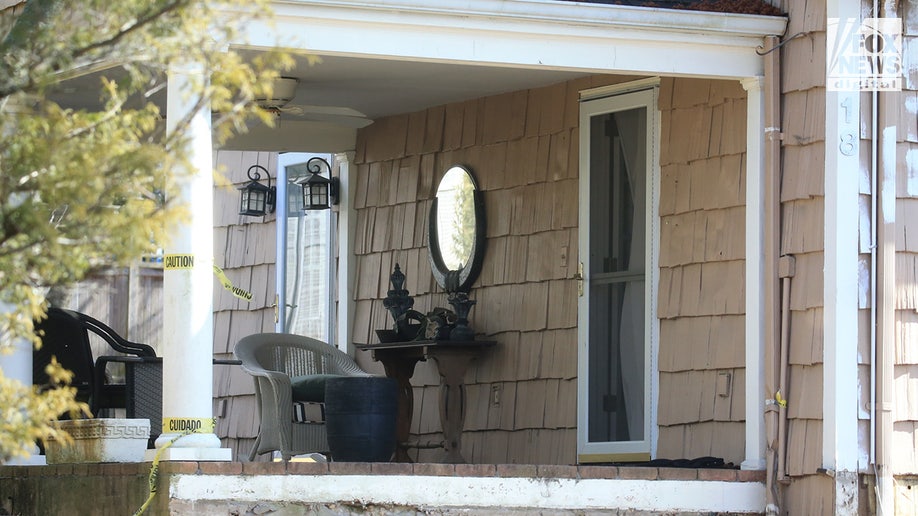 An exterior view of the front entrance of Joseph and Susana Landa’s home where squatter Brett Flores has taken over.