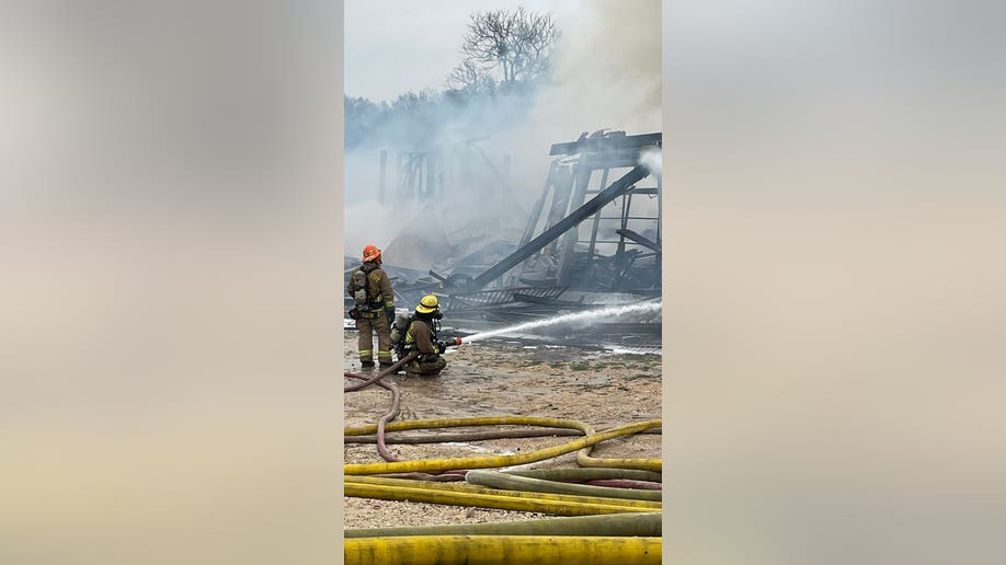 Austin firefighters at four-alarm fire site