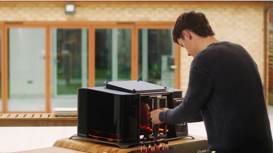 A see-through grill with AI cooks steak in only 90 seconds