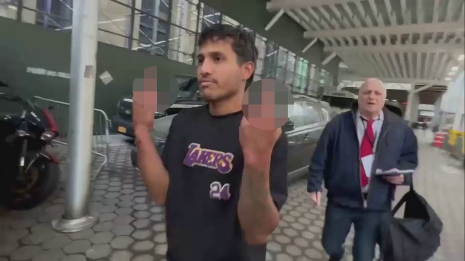 Blurred_Illegal-migrant-flips-the-bird-after-arrest-for-attacking-NYPD-officers-Blurred.jpg
