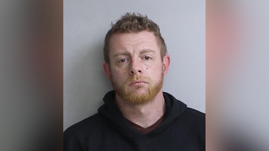 Convicted felon with night vision goggles and gun arrested after lurking outside ex-girlfriend's house: police