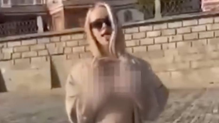 Russian government hunting Ukrainian OnlyFans model who posed topless in front of church