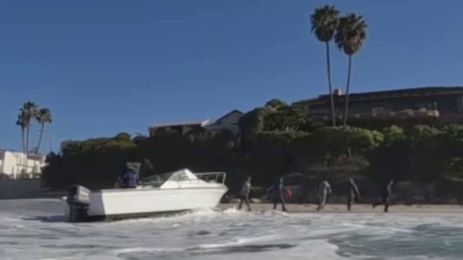 Suspected illegal migrants land boat on San Diego beach and flee into wealthy village