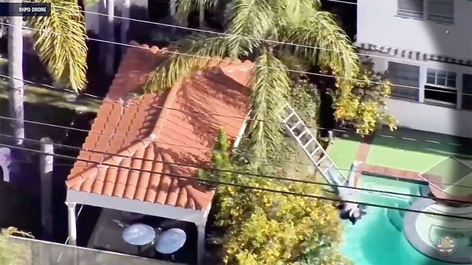 Beverly Hills police drone catches burglary suspect fall off ladder into pool