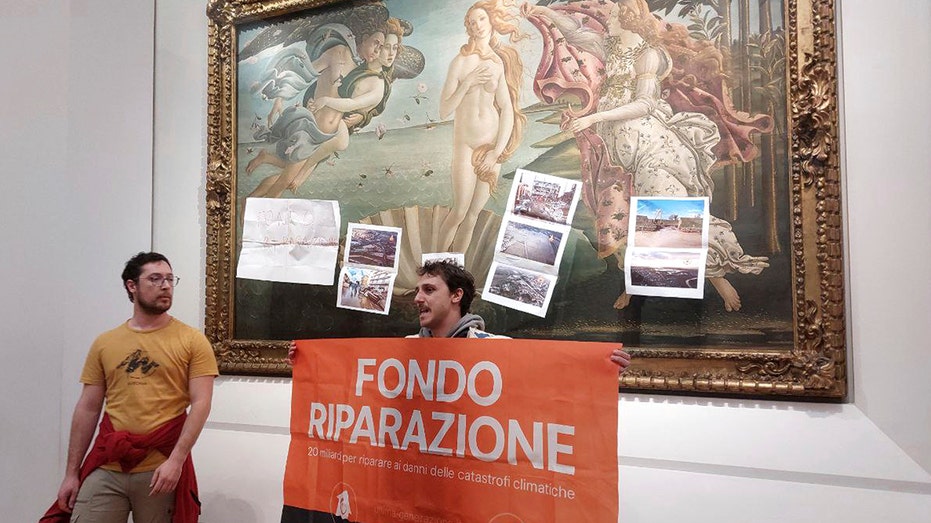 Climate activists in Italy cover Botticelli's 'Birth of Venus' with pictures of flood damage