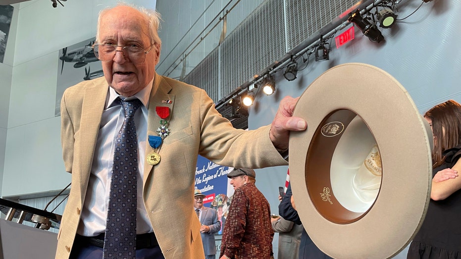 New Orleans hat salesman, 99, honored by French president for WWII service