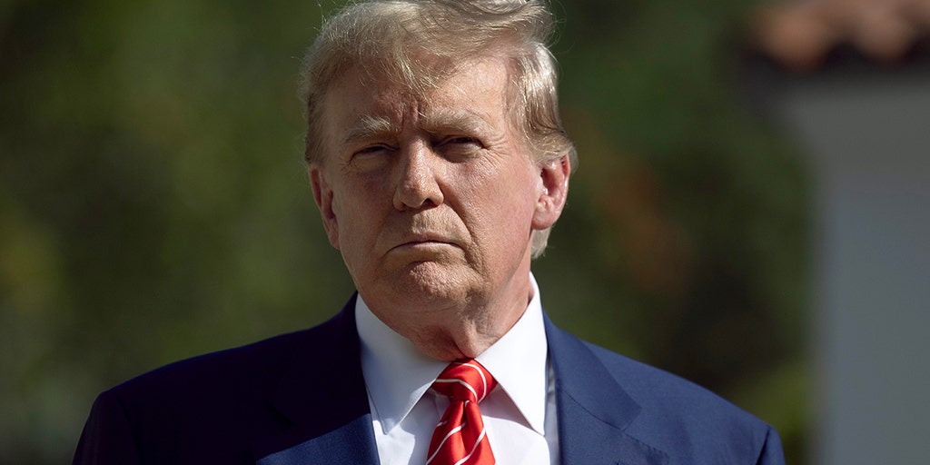 Trump silent as Biden signs $1.2 trillion spending bill amid GOP infighting