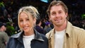 Alix Earle (L) and Braxton Berrios attend a basketball game between the Los Angeles Lakers and the Atlanta Hawks at Crypto.com Arena on March 18, 2024 in Los Angeles, California.