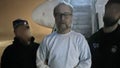 Edimir Gustavo Eckelberg, 62, seen with immigration agents before being deported back to Brazil. He fled to the U.S. after his child rape conviction, authorities said.