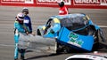 Joey Gase, driver of the #35 NCPC Race Against Crime Chevrolet, removes his wrecked rear bumper cover to throw at Dawson Cram, driver of the #4 TeamJDMotorsports.com Chevrolet, after an on-track incident during the NASCAR Xfinity Series ToyotaCare 250 at Richmond Raceway on March 30, 2024 in Richmond, Virginia.