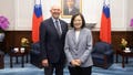 Taiwan's President Tsai Ing-wen, right, poses for photos with Rep. Jack Bergman, R-Mich., in Taipei, Taiwan on Thursday, March 28, 2024. Bergman leads a bipartisan U.S. congressional delegation that pledged continued support for Taiwan on Thursday, days after Congress approved $300 million in military aid for the self-governed island that's claimed by China.