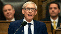 Wisconsin Gov. Tony Evers addresses a joint session of the state Legislature in the Assembly chambers during his State of the State speech at the state Capitol, Jan. 22, 2019, in Madison, Wis.