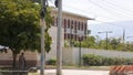 A police officer guards the entrance of the U.S. embassy in Port-au-Prince, Haiti, on Sunday, March 10.