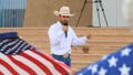 Couy Griffin, a former Otero County commissioner and cofounder of Cowboys for Trump, speaks during a gun rights rally in Albuquerque, New Mexico, Sept. 12, 2023.