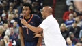 Head coach Lorenzo Romar of the Pepperdine Waves speaks with Michael Ajayi #1 during the second half against the Gonzaga Bulldogs at Spokane Veterans Memorial Arena on January 4, 2024 in Spokane, Washington.