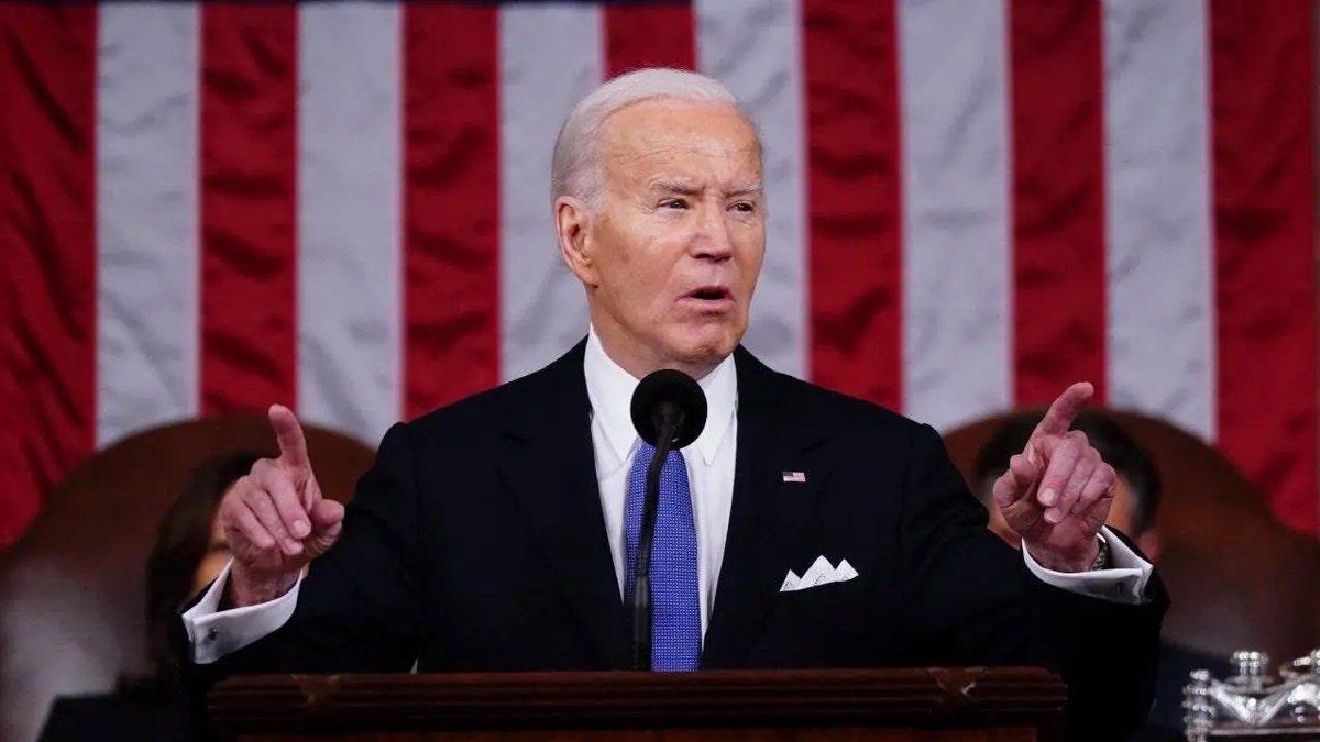 US President Joe Biden speaking at the State of the Union in House chamber.