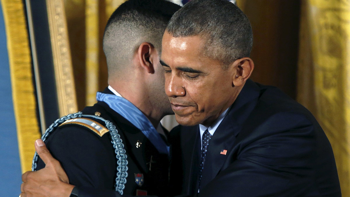 president obama embraces flo groberg