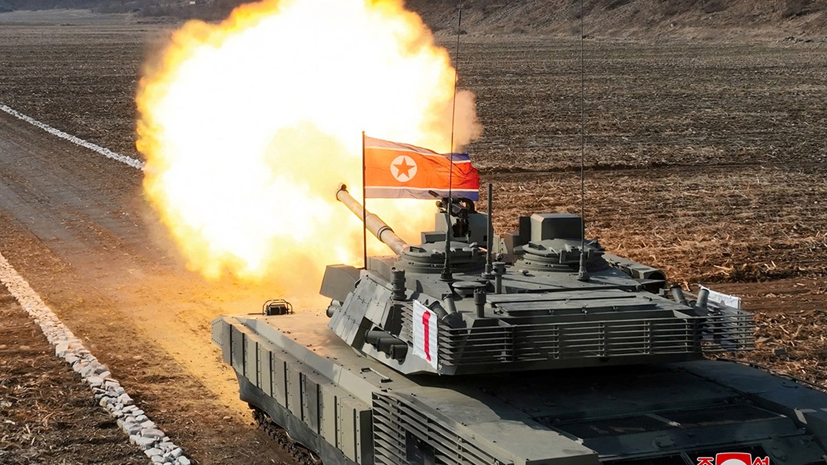 Tank firing a live round