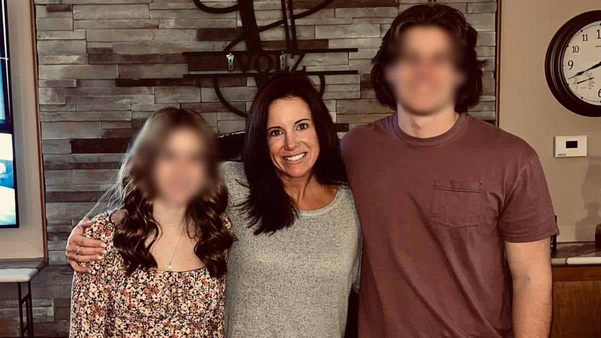 Stefanie Smith pictured with her children, whose faces are blurred
