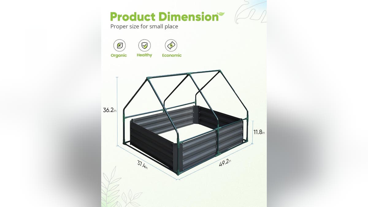 This greenhouse and raised bed combo makes gardening easy. 